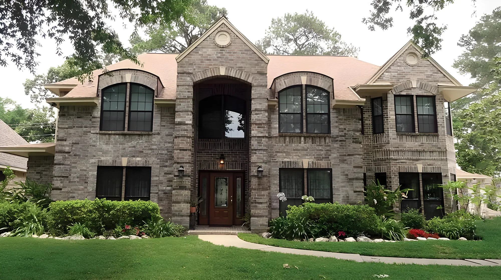 Two-story brick home with new replacement windows